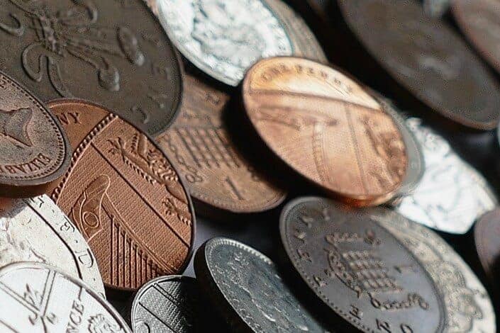 pile of assorted-denomination coins