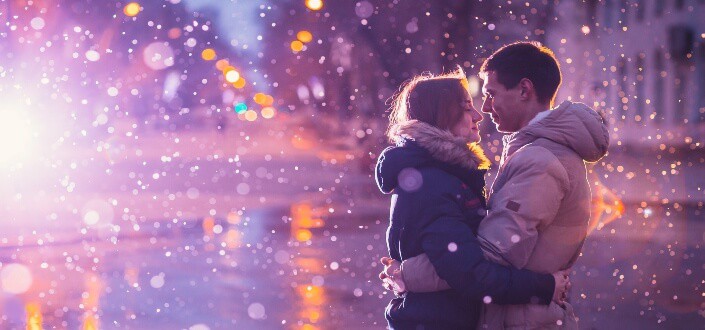 couple hugging while looking at each other