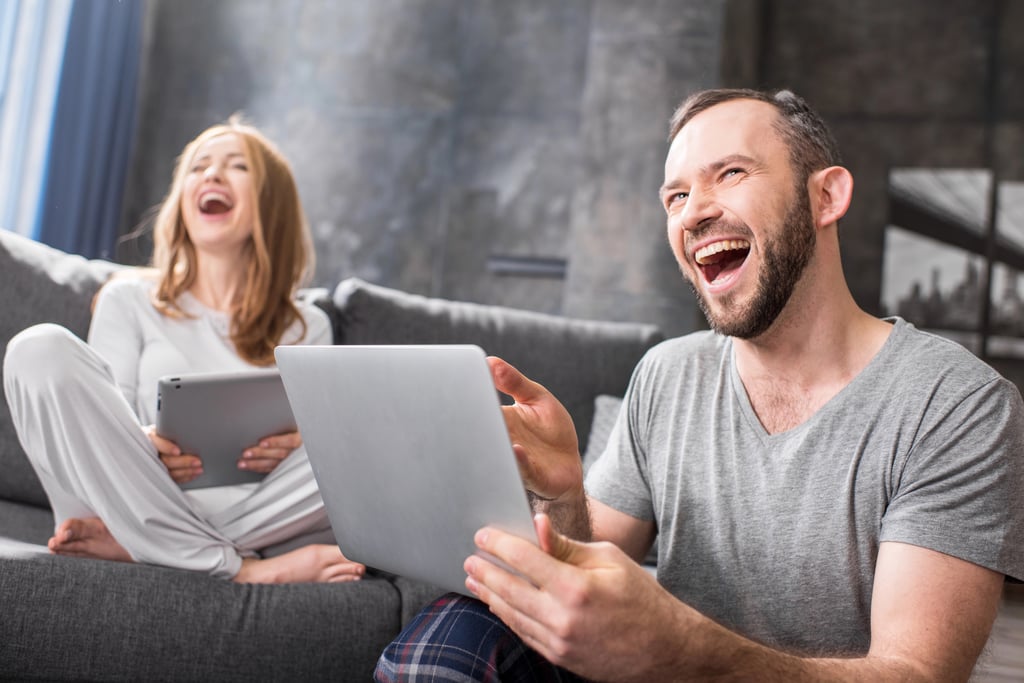 A couple laughing.