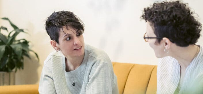 Colleagues discussing a project