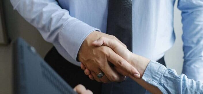 Two people hand shaking