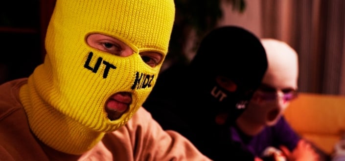 Three mans wearing masks