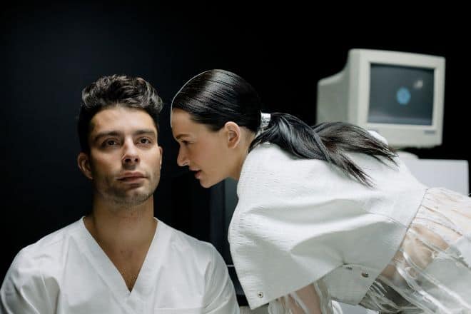 Woman Whispering to a Man - Paranoia Questions