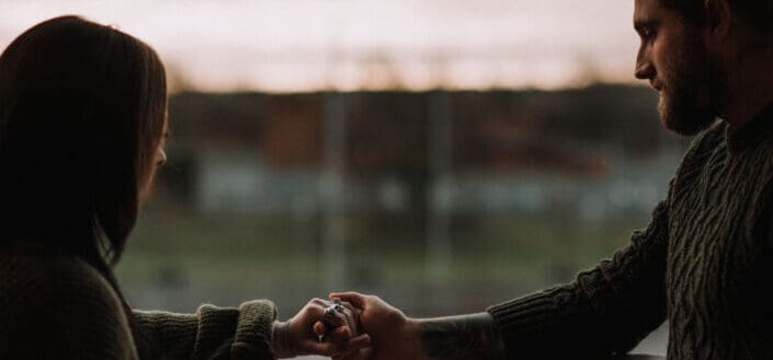 Couple holding hands