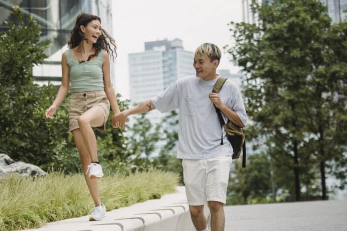 Happy romantic couple having fun in park