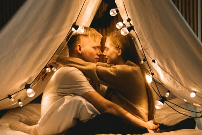 A couple inside a teepee - 5 Girl's Secrets Guys Don't Know
