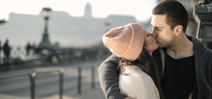 couple hugging and kissing