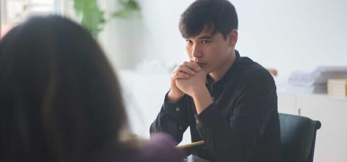 Man Staring at a Woman in Their Office