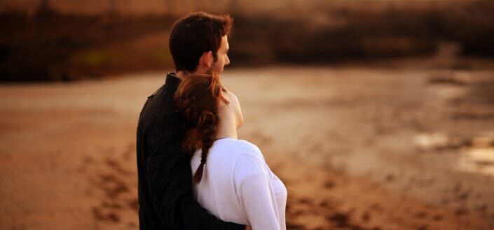 Couple Watching The Sunset