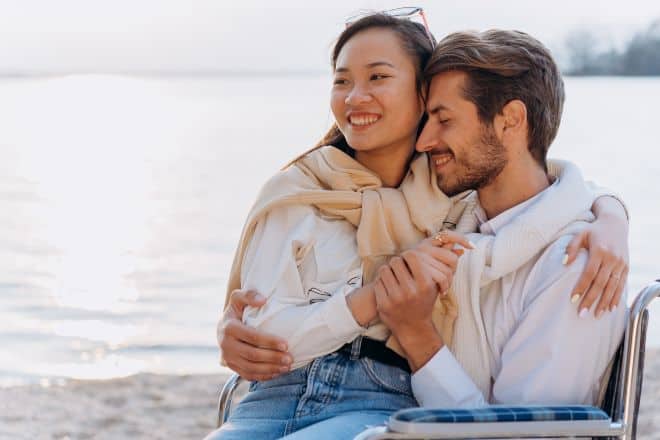 A romantic couple hugging on the beach - Soul connection