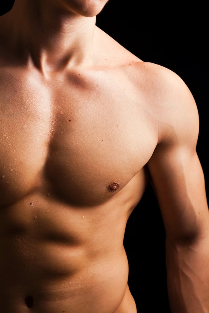 Young man with clean-shaven chest.