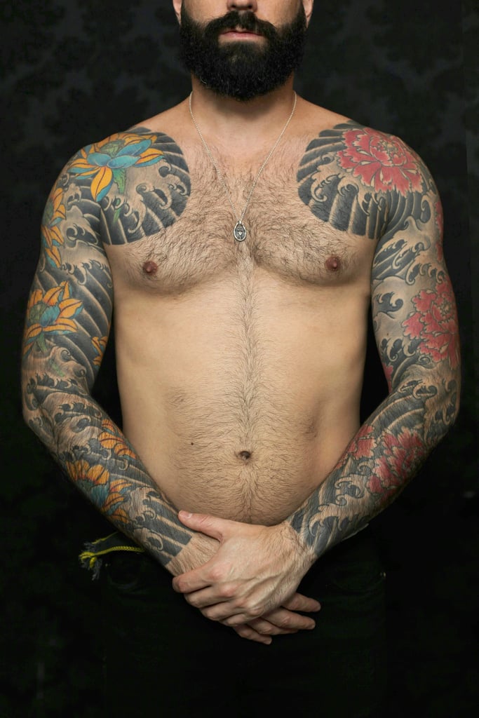 Tattooed man with Tapered Into Stomach/Abdominal chest hair.
