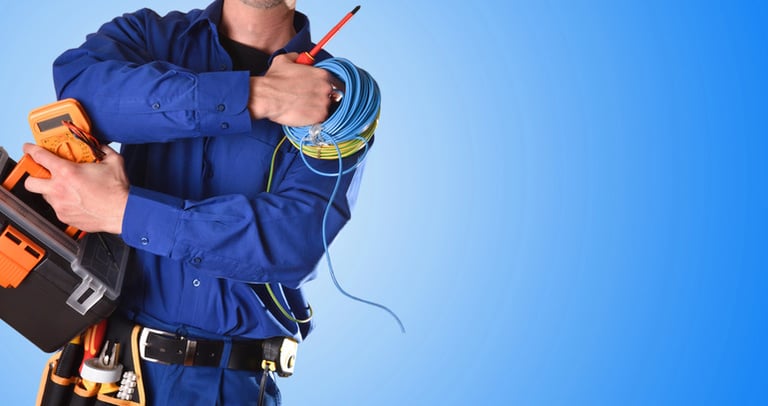 An electrician with a set of electrician tools and equipment