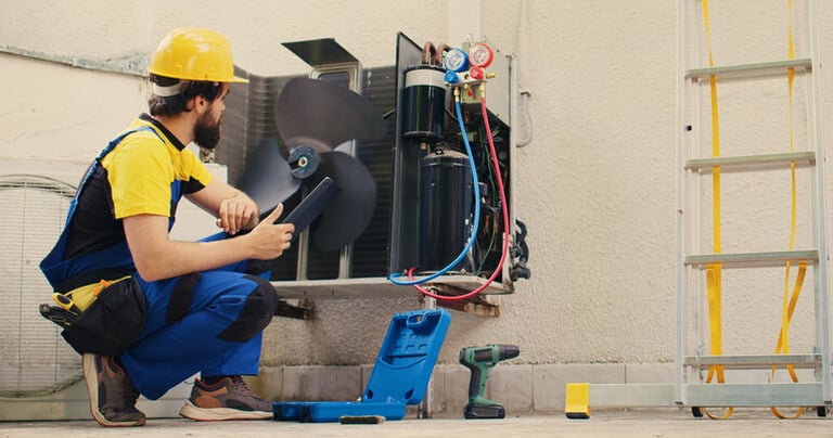A qualified electrician is repairing an electrical circuit