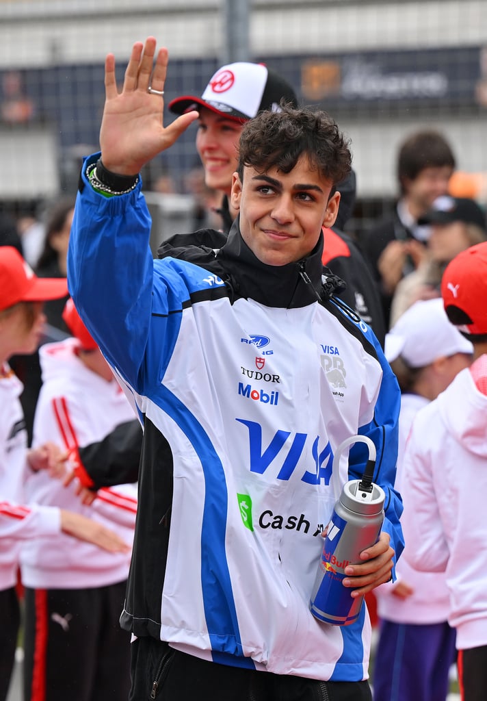 MONTREAL, QUEBEC - MAY 24: Arvid Lindblad of Great Britain and Visa Cash App Racing Bulls waves on the drivers parade prior to the F1 Grand Prix of Canada at Circuit Gilles-Villeneuve on May 24, 2026 in Montreal, Quebec.