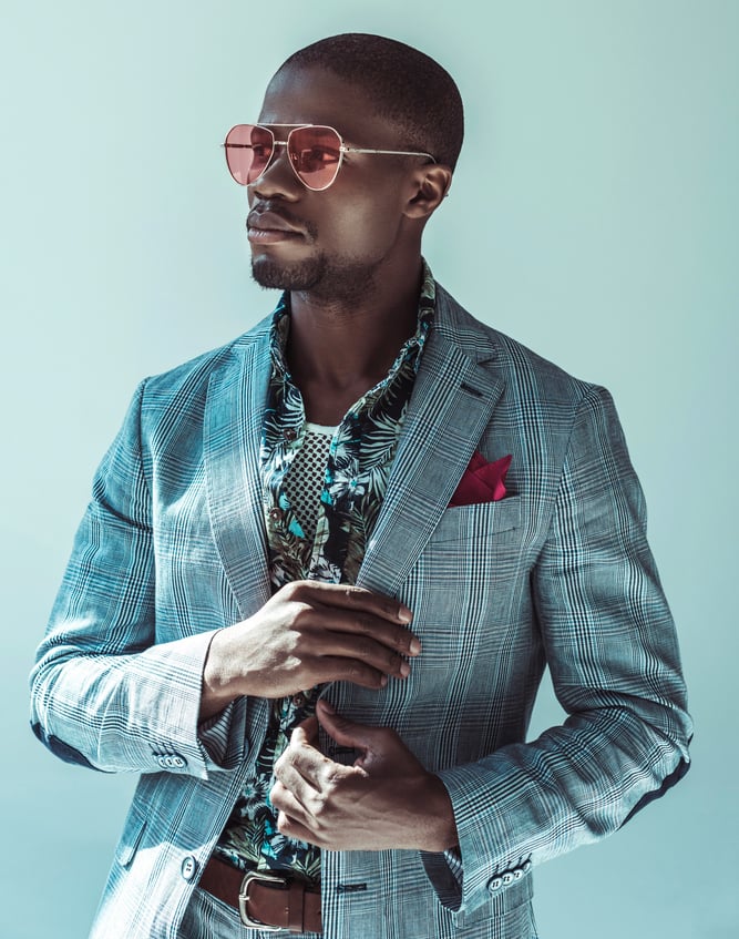 Well dressed black man in a stylish suit with sunglasses