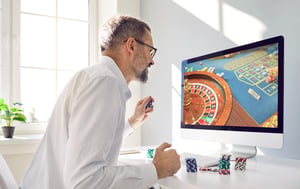 A man playing an online casino game.