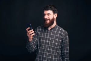 Man searching for a phone app.