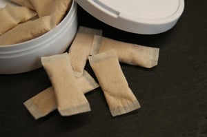 An open box of nicotine pouches.