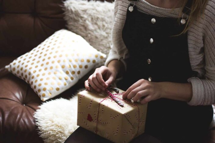 woman preparing a gift