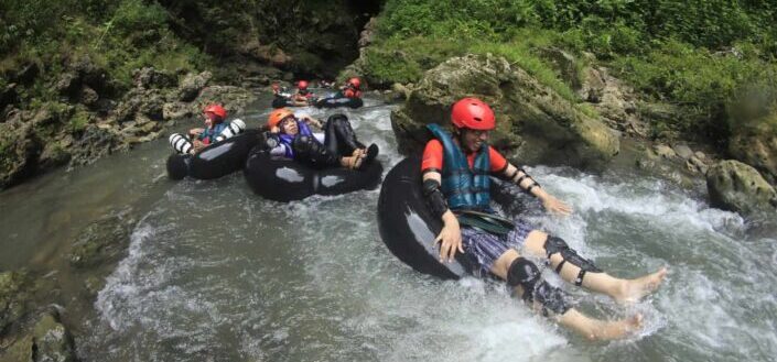 group of people having an outdoor water adventure