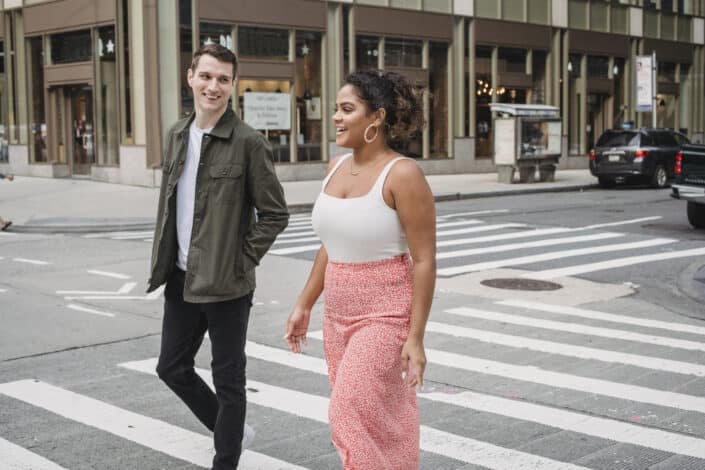 A couple walking on the pedestrian lane