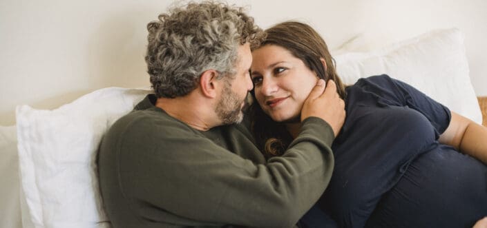 Husband carefully caressing his wife's face