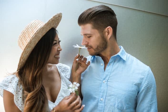 Woman Showing Flower to a Man